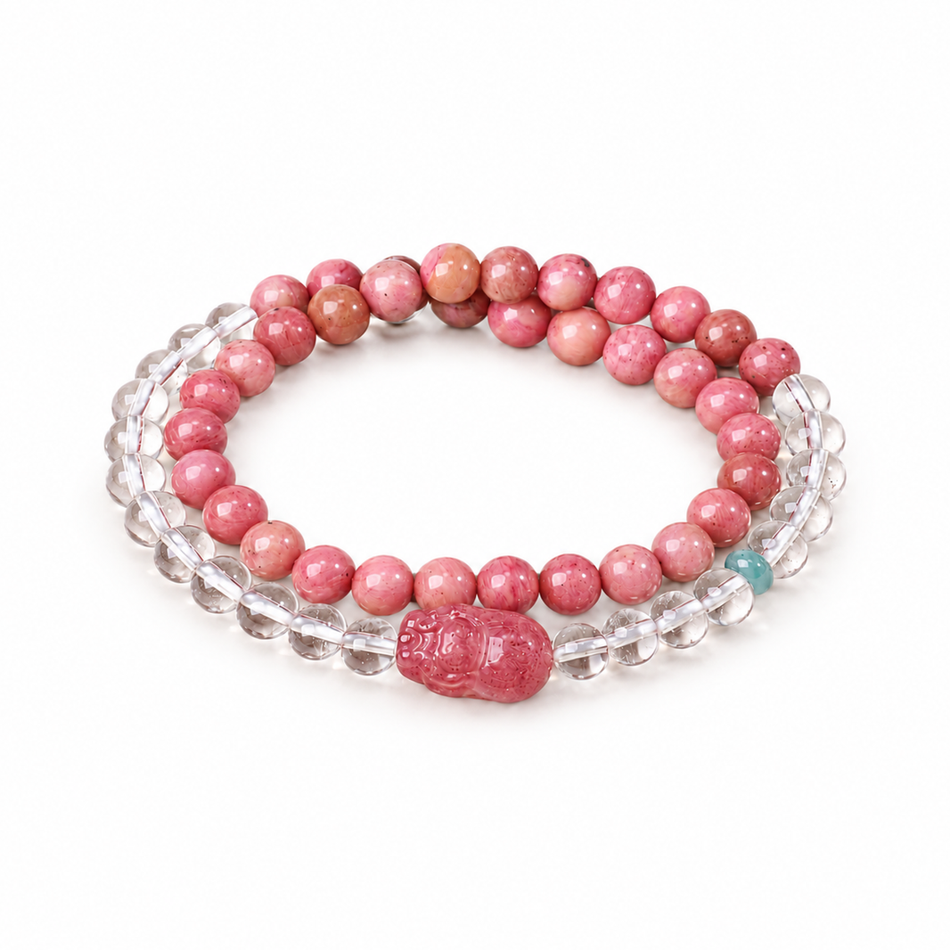 Pink stone and clear quartz double-wrap bracelet with Pixiu on white