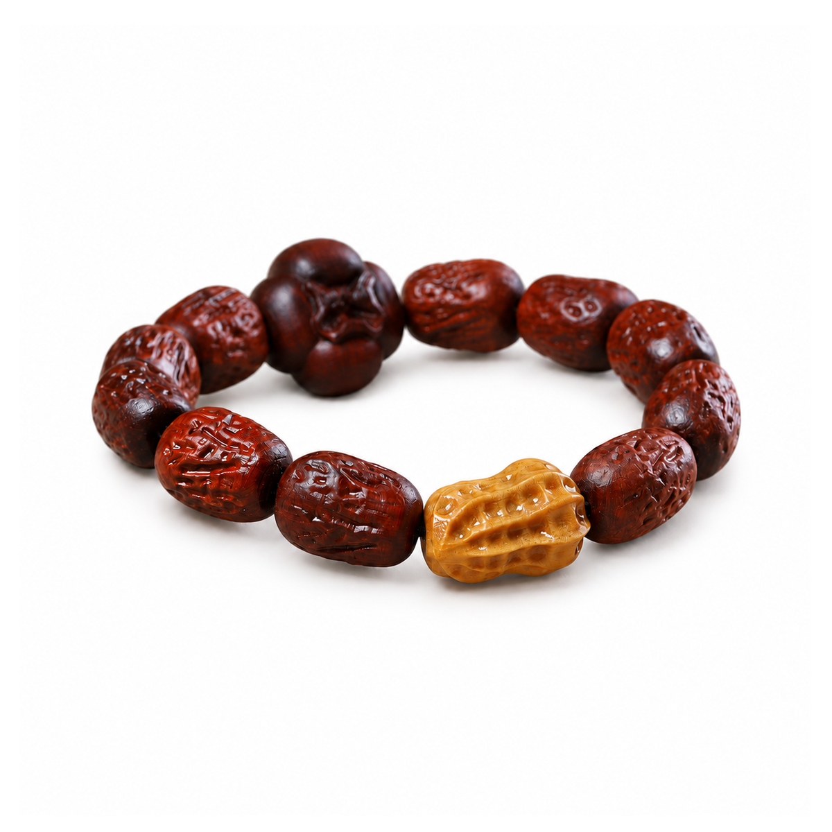 Carved red sandalwood bracelet with yellow peanut and dark persimmon accents on white