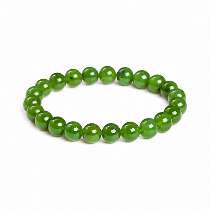 Green Hetian jade round bead bracelet on white background