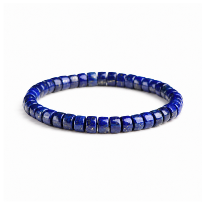 Natural lapis lazuli disc bead bracelet on white background