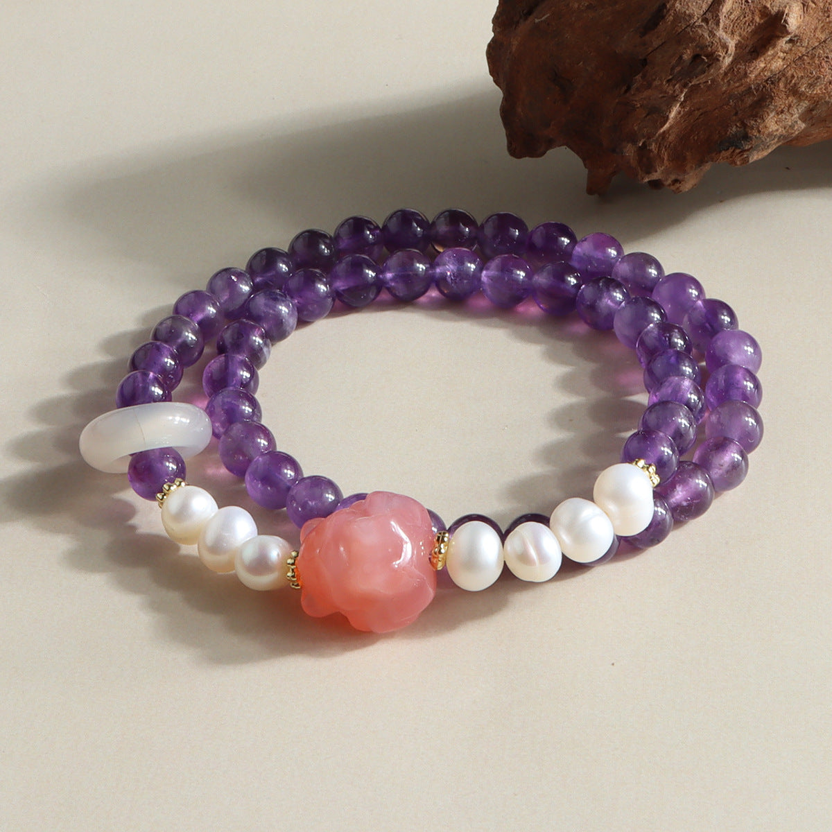 Amethyst double-wrap bracelet with freshwater pearls and pink fox carving