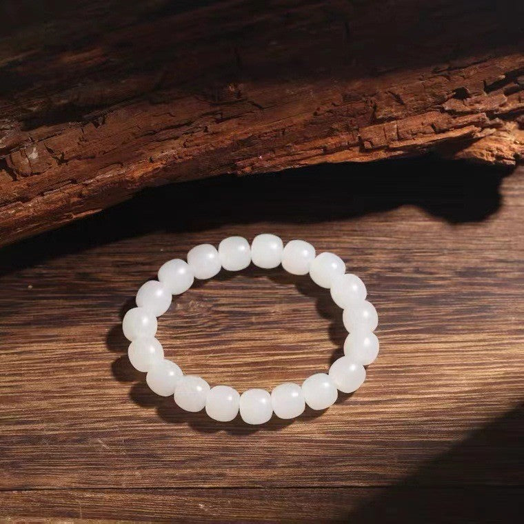White Hetian jade barrel bracelet — source photo shared by 7 x 8 and 9 x 10 mm options