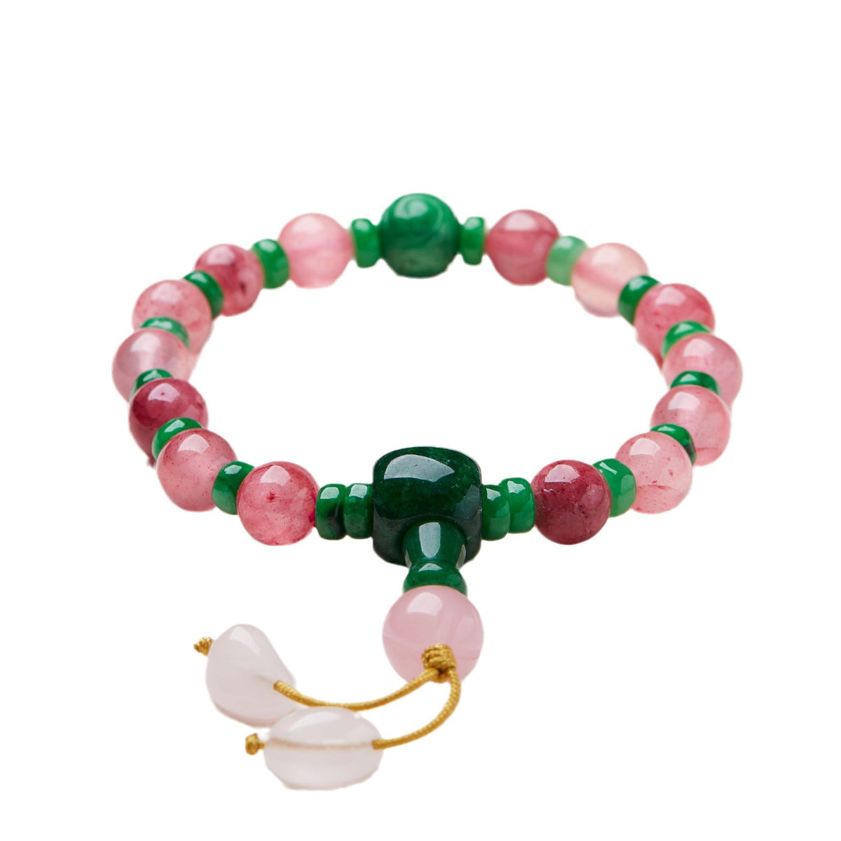 Pink patterned bead bracelet with green accents on a white background