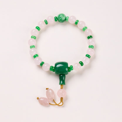 Rose Quartz – 8mm Palace Style bracelet with green accents and cord drops