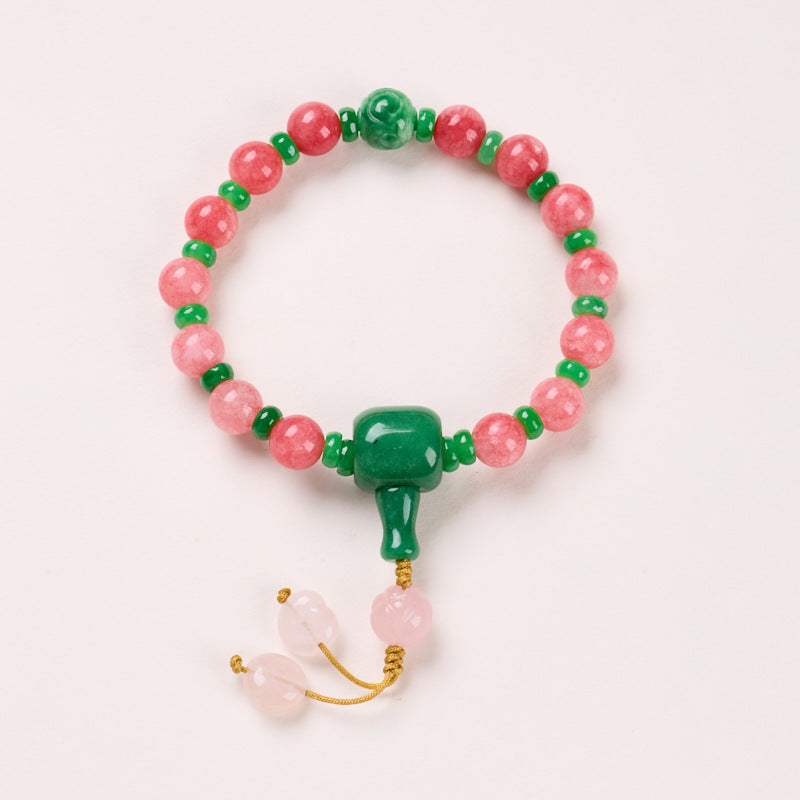 Enhanced Rhodochrosite – 14 Beads bracelet with green accents and cord drops
