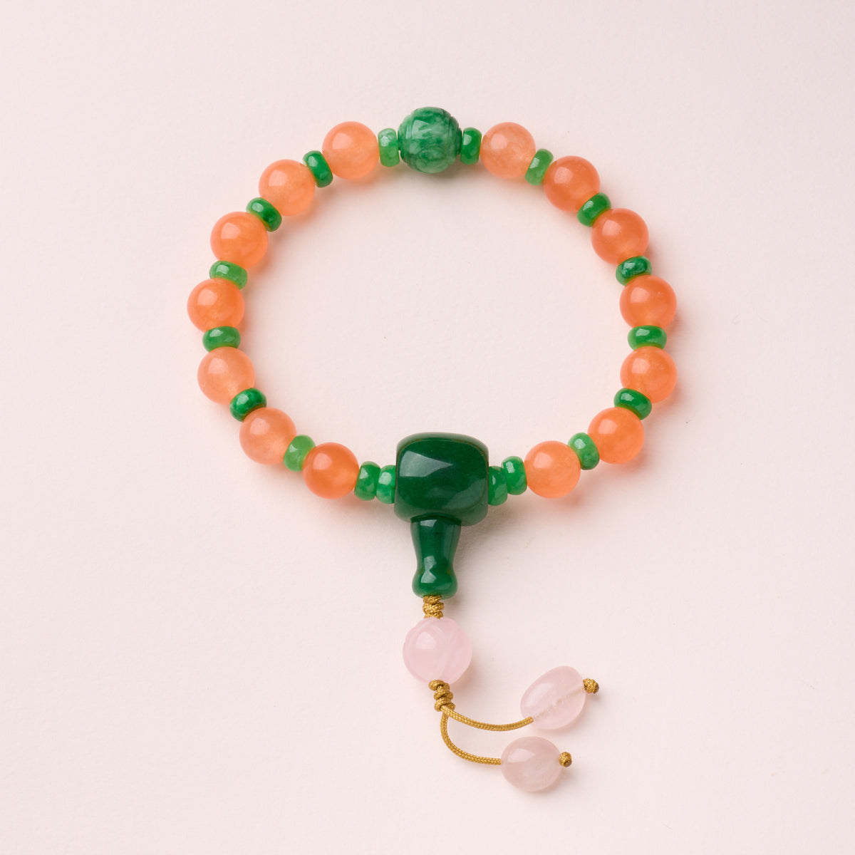 Orange Beads – Palace Style bracelet with green accents and cord drops