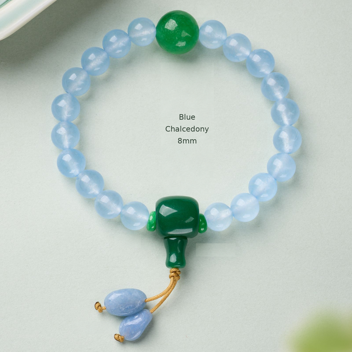Blue Chalcedony – 8mm bracelet with green accents and cord drops