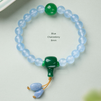Blue Chalcedony – 8mm bracelet with green accents and cord drops