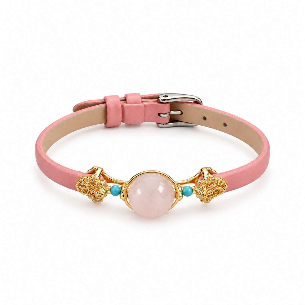 Rose quartz bead pink leather strap bracelet in a low angle view on white