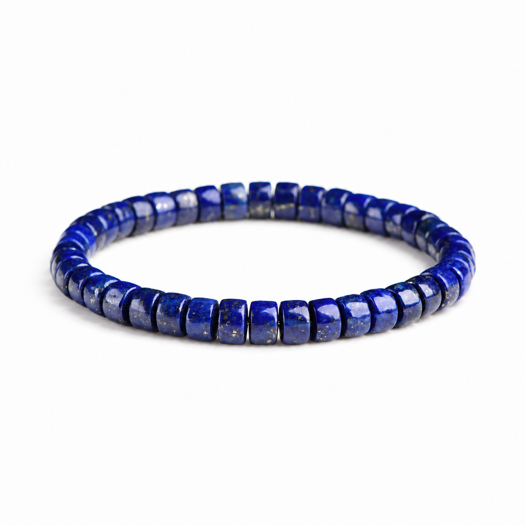 Natural lapis lazuli disc bead bracelet on white background