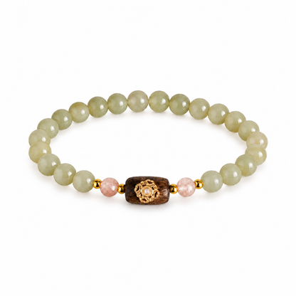 Hetian jade clover bracelet with muted olive-green beads and pink accents on white background