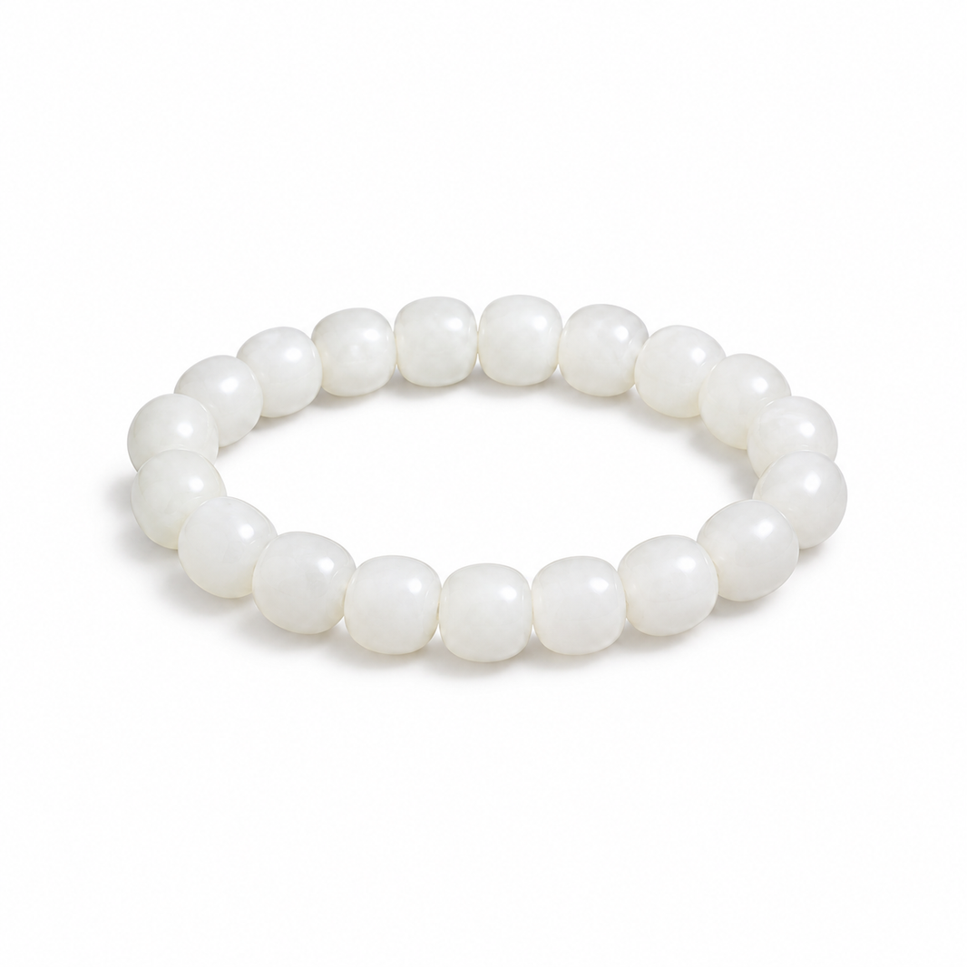White Hetian jade 6 x 7 mm barrel bead bracelet on white background