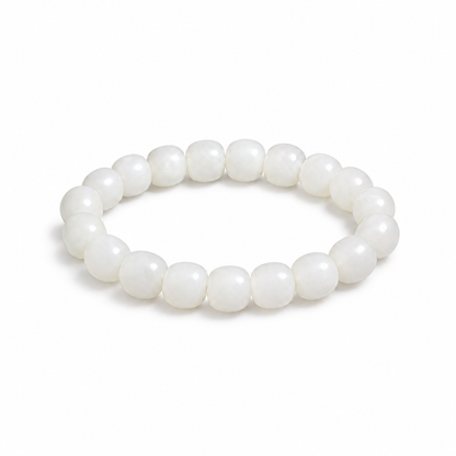 White Hetian jade 6 x 7 mm barrel bead bracelet on white background