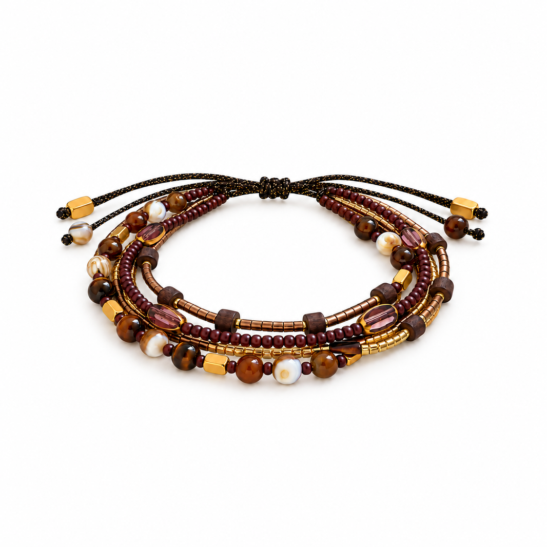 Shell bead multi-row adjustable bracelet on white background