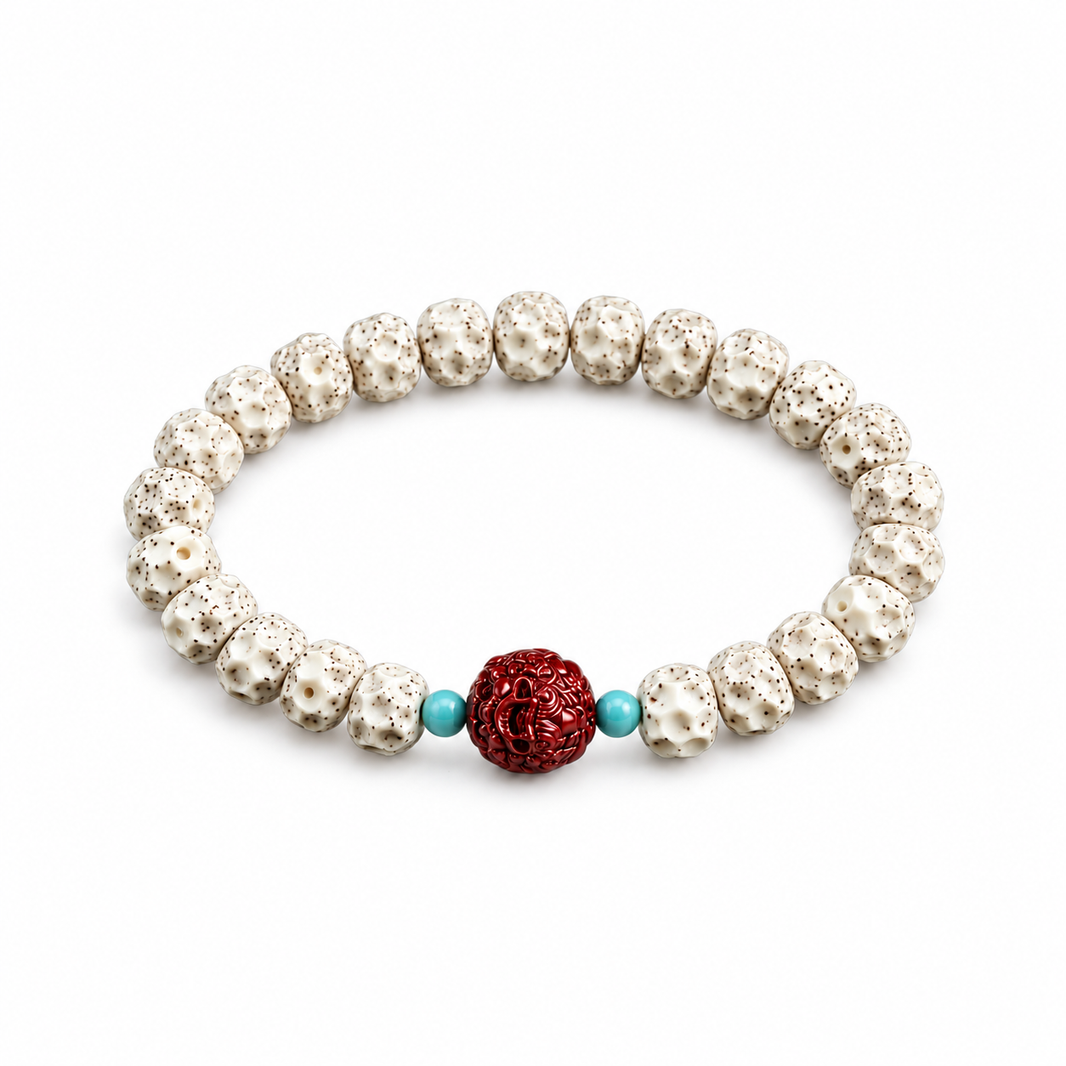 Single star and moon bodhi bracelet with cream-white textured beads, red carved Pixiu accent and two blue-green spacers on white