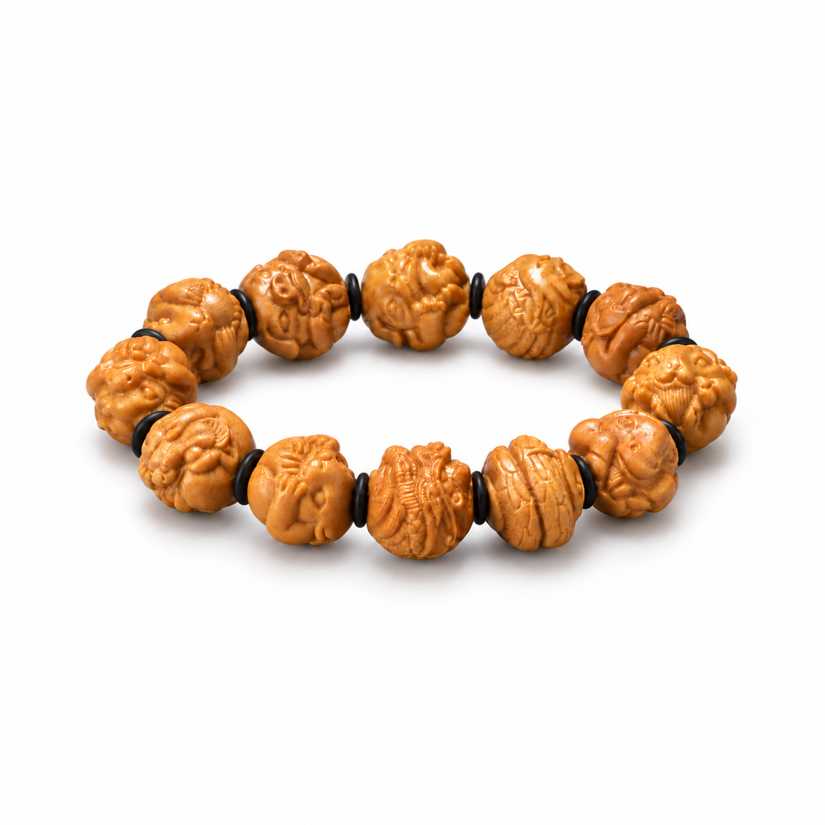Honey-toned sandalwood zodiac bracelet with carved animal beads and black spacers on white