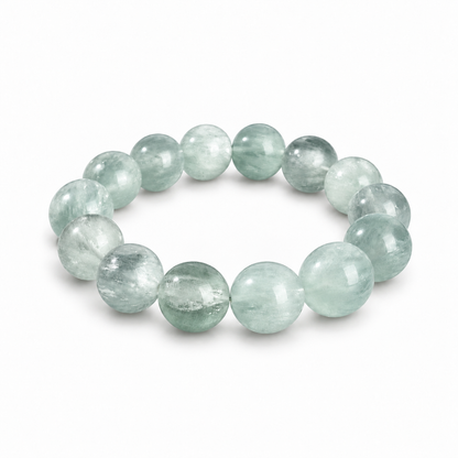 Pale mint green round bead bracelet on a white background