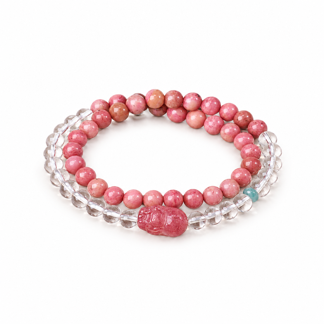 Pink stone and clear quartz double-wrap bracelet with Pixiu on white