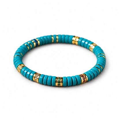Teal-green treated turquoise-style tablet bead bracelet on white background