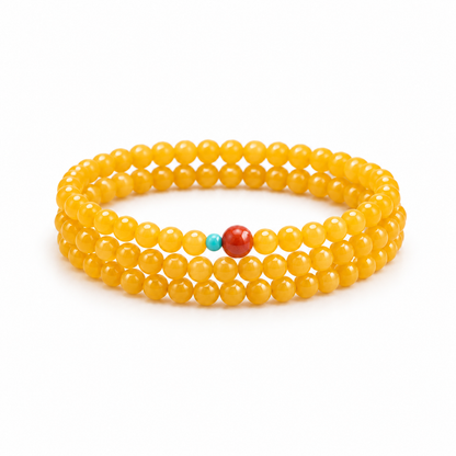 Yellow agate triple-wrap bracelet with red and turquoise-color accent beads